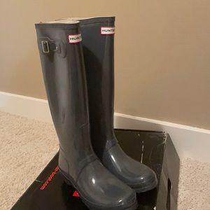 Grey knee high Hunter rain boots